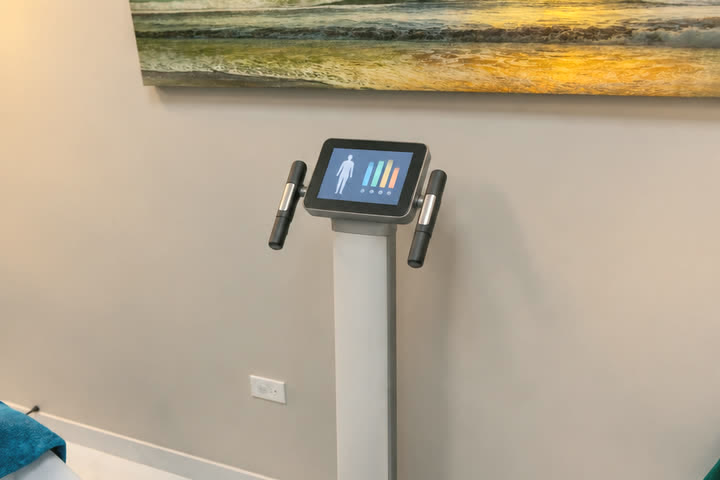 A body composition analyzer in a Qua treatment room